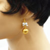 Boucles d'oreilles nœud perle dorée - Cinderella – Image 3