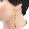 Boucles d'oreilles pendantes étoiles - Poussières d'étoiles – Image 3